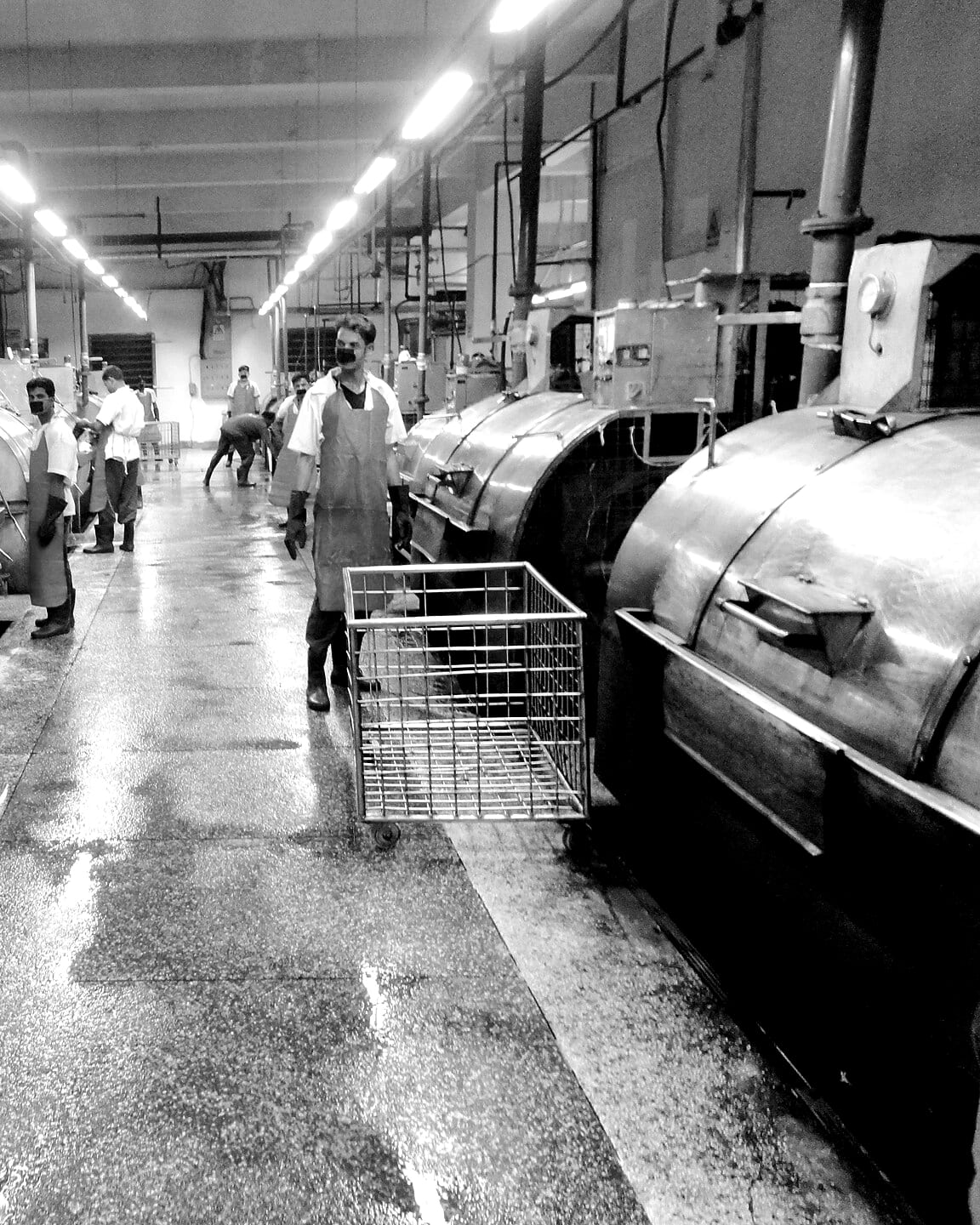 Industrial machines on a denim washing floor